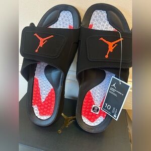 Jordan Hydro VI Retro Slide sandals in the Black/Infrared 23 colorway